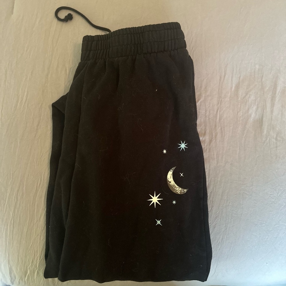 BLACK STAR SWEATPANTS